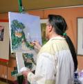  Félix qui peint un tableau partant de son ébauche au salon de Veigné 2010